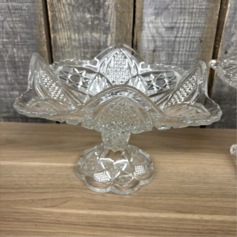Two Pieces of Vintage American Pressed Glass Including a Whirling Star Pattern Compote and a Diamond Point Cake Stand