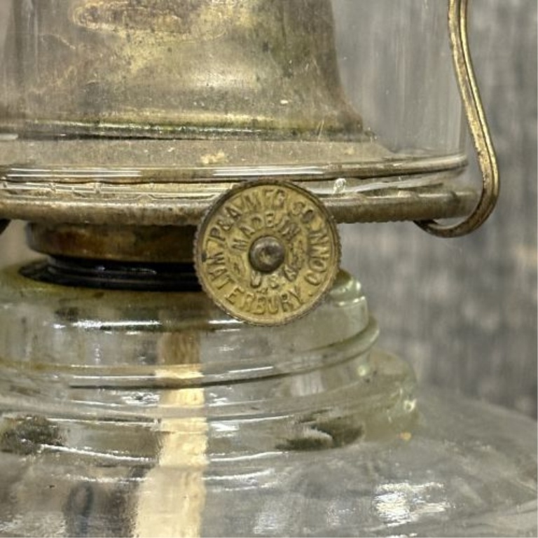 A Pair of Plume and Atwood Clear Pressed Glass Kerosene Lamps