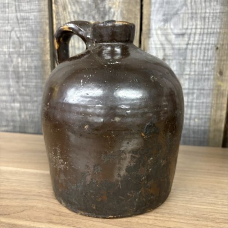 A Pair of Antique American Stoneware Beehive Jugs in Albany-Type Slip Glaze