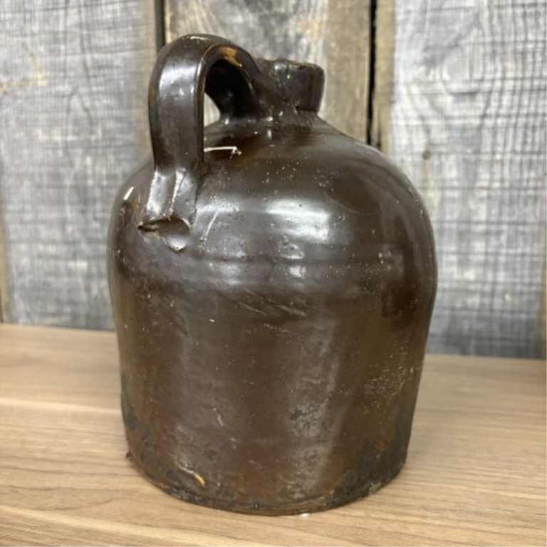 A Pair of Antique American Stoneware Beehive Jugs in Albany-Type Slip Glaze