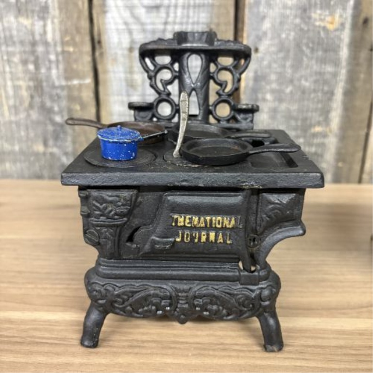 Two Antique Miniature Cast Iron Toy Stoves