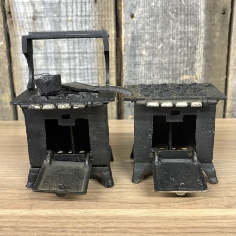 A Collection of Vintage Miniature Cast Iron Toy Stoves including Queen Models