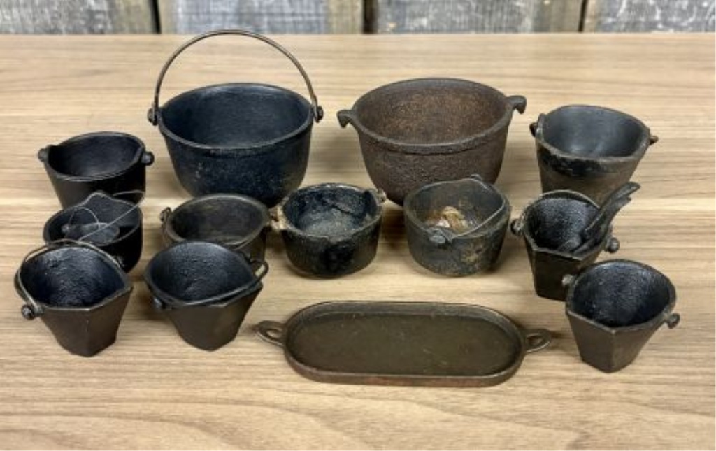 A Collection of Fourteen Vintage Miniature Cast Iron Cookware and Hearth Items
