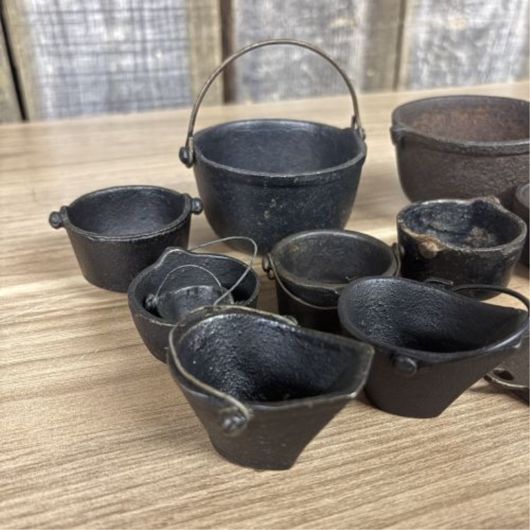 A Collection of Fourteen Vintage Miniature Cast Iron Cookware and Hearth Items