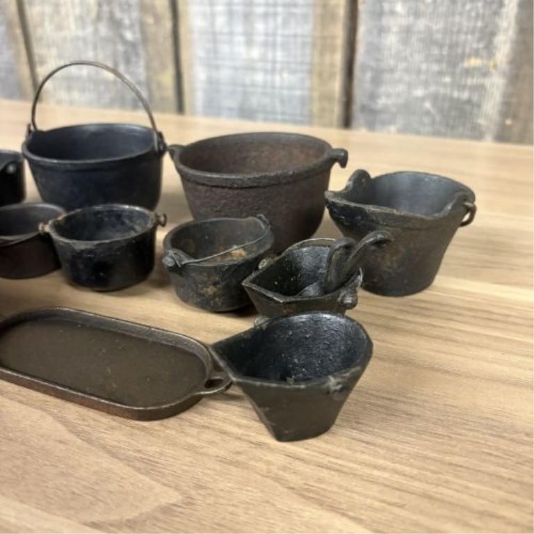 A Collection of Fourteen Vintage Miniature Cast Iron Cookware and Hearth Items