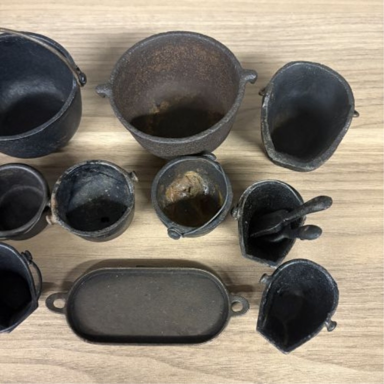 A Collection of Fourteen Vintage Miniature Cast Iron Cookware and Hearth Items