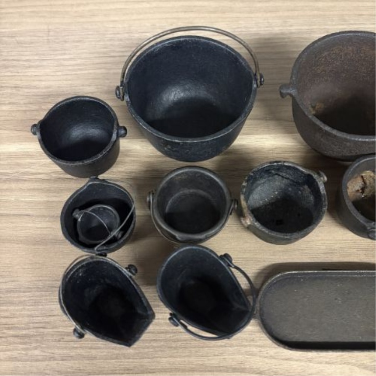 A Collection of Fourteen Vintage Miniature Cast Iron Cookware and Hearth Items
