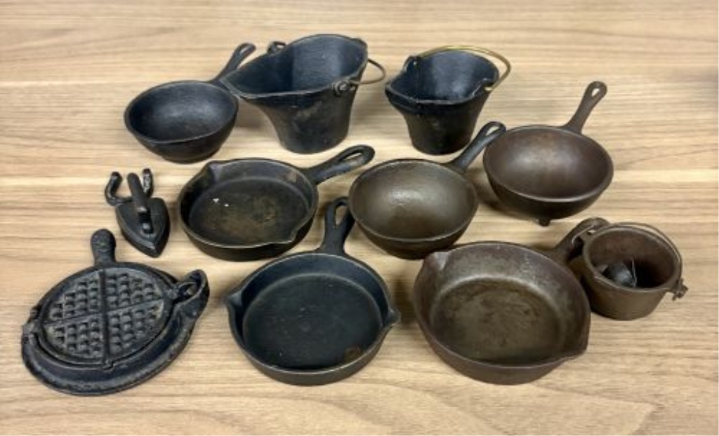 An Assortment of Vintage Miniature Cast Iron Household and Kitchen Items
