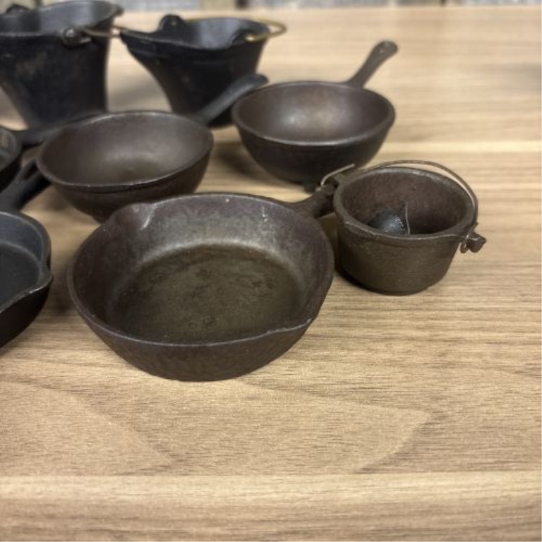 An Assortment of Vintage Miniature Cast Iron Household and Kitchen Items