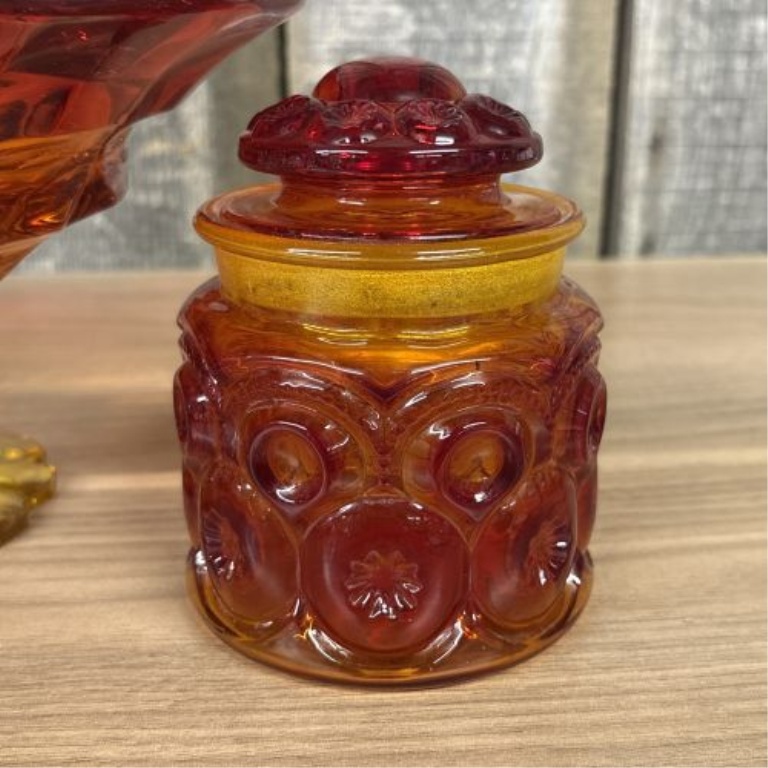 Two Pieces of Vintage Amberina Glass including a Large Pedestal Compote and a Lidded Jar