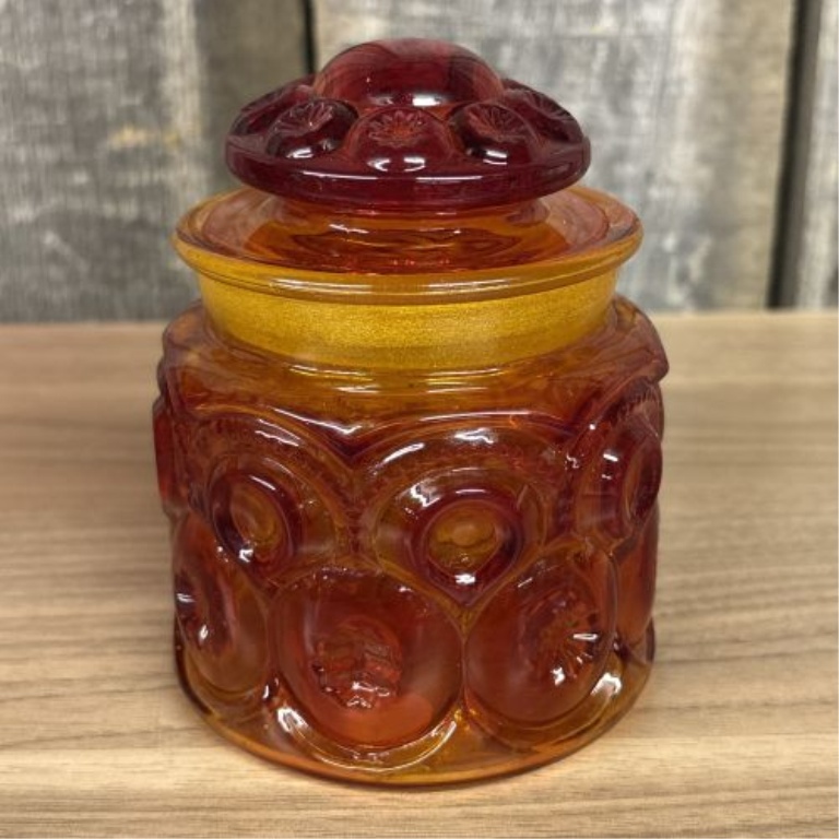 Two Pieces of Vintage Amberina Glass including a Large Pedestal Compote and a Lidded Jar