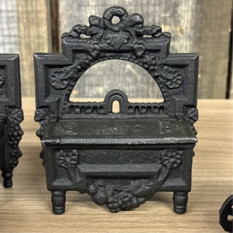 A Set of Four Miniature Cast Iron Toys and Decorative Match Holders