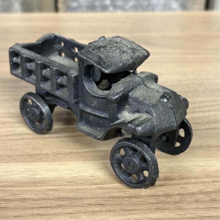 A Set of Four Miniature Cast Iron Toys and Decorative Match Holders