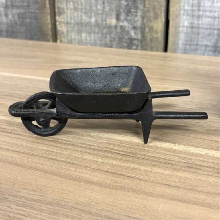 A Set of Four Miniature Cast Iron Toys and Decorative Match Holders