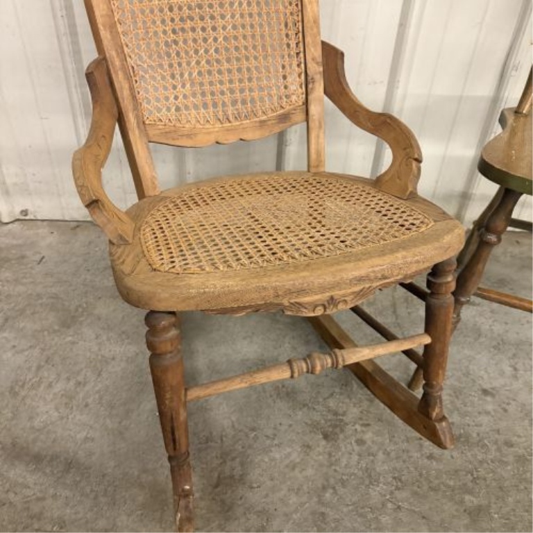 Two American Wooden Chairs including a Victorian Style Caned Rocker and a Press-Back Spindle Chair