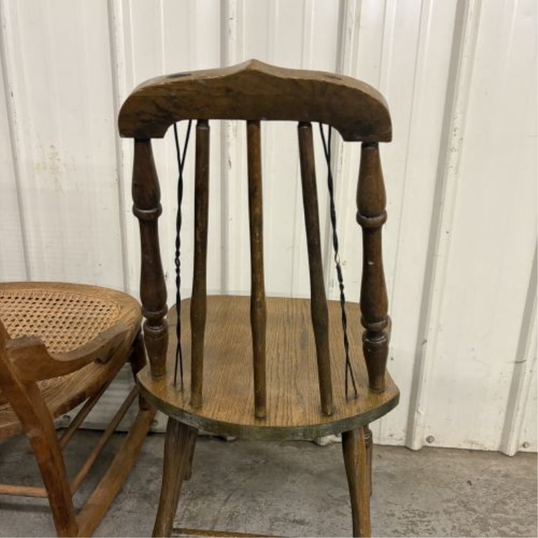 Two American Wooden Chairs including a Victorian Style Caned Rocker and a Press-Back Spindle Chair