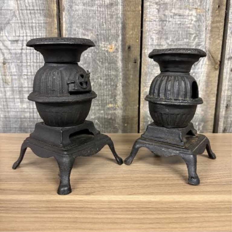 A Pair of Miniature Cast Iron Potbelly Stoves
