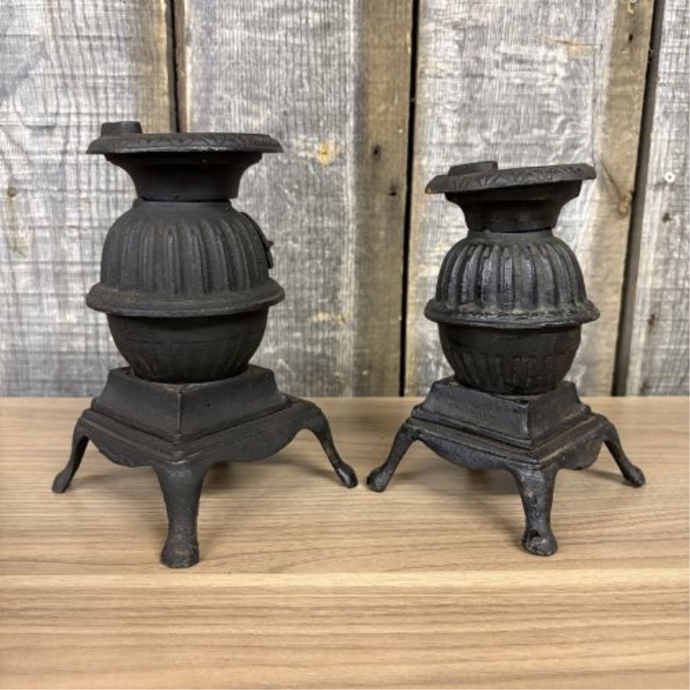 A Pair of Miniature Cast Iron Potbelly Stoves