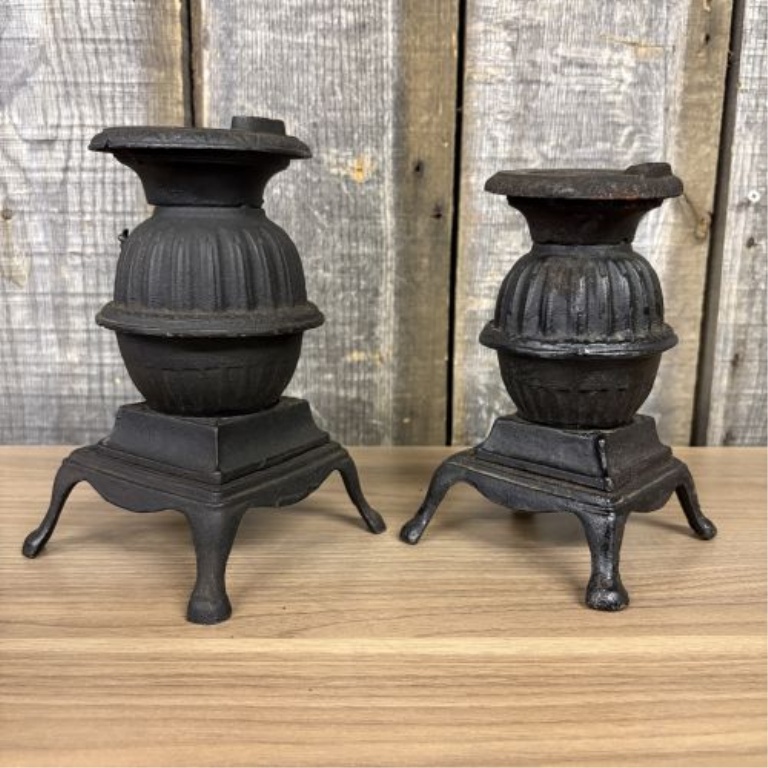 A Pair of Miniature Cast Iron Potbelly Stoves
