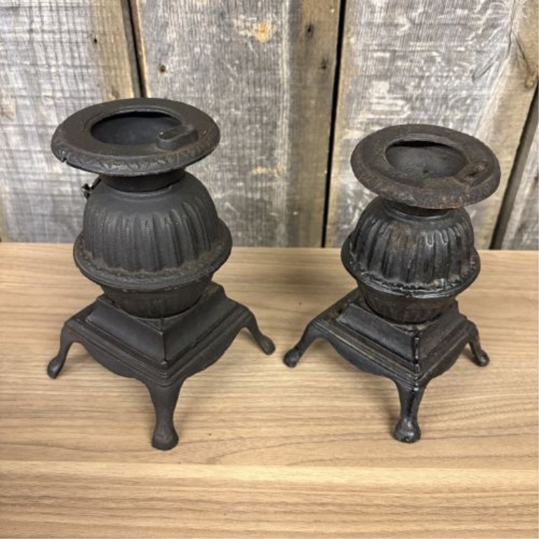 A Pair of Miniature Cast Iron Potbelly Stoves