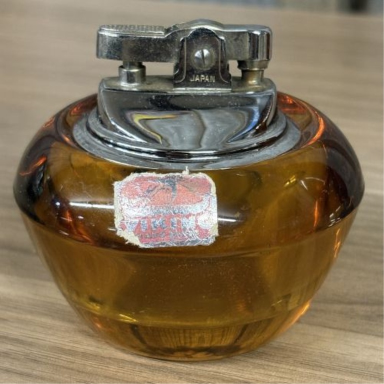 A Pair of Mid-Century Modern Amber Glass Table Lighters Including Viking Glass