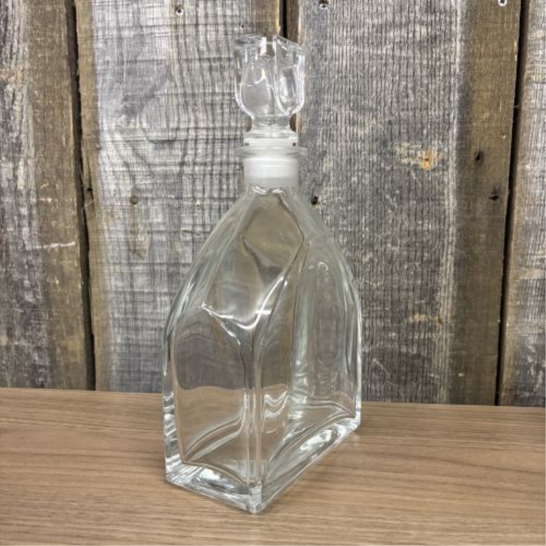 A Trio of Glass Spirit Decanters Including a Pair of Cut Glass and One Luigi Bormioli Style Example