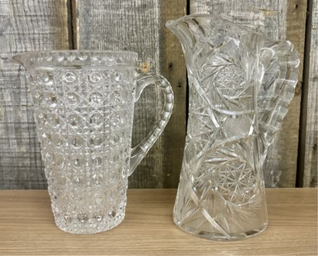 Two Glass Pitchers Including a Teutonic Pattern EAPG Example and an American Brilliant Period Cut Glass Style Pitcher