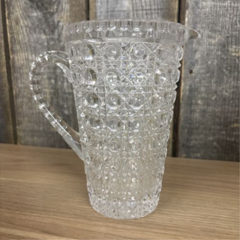 Two Glass Pitchers Including a Teutonic Pattern EAPG Example and an American Brilliant Period Cut Glass Style Pitcher