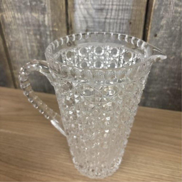 Two Glass Pitchers Including a Teutonic Pattern EAPG Example and an American Brilliant Period Cut Glass Style Pitcher
