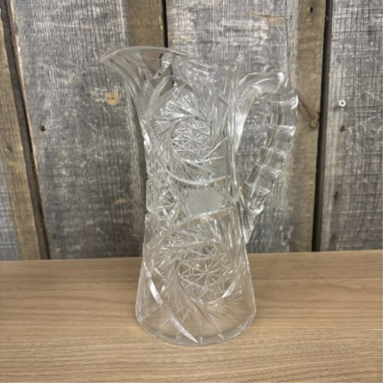 Two Glass Pitchers Including a Teutonic Pattern EAPG Example and an American Brilliant Period Cut Glass Style Pitcher