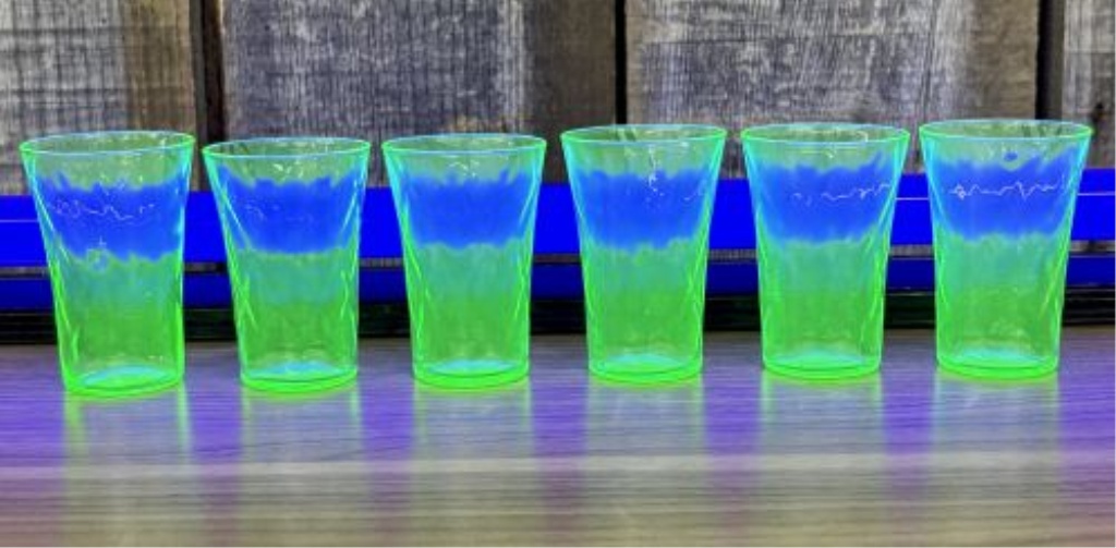 A Set of Six Green Uranium Depression Glass Shot Glasses with Optic Pattern