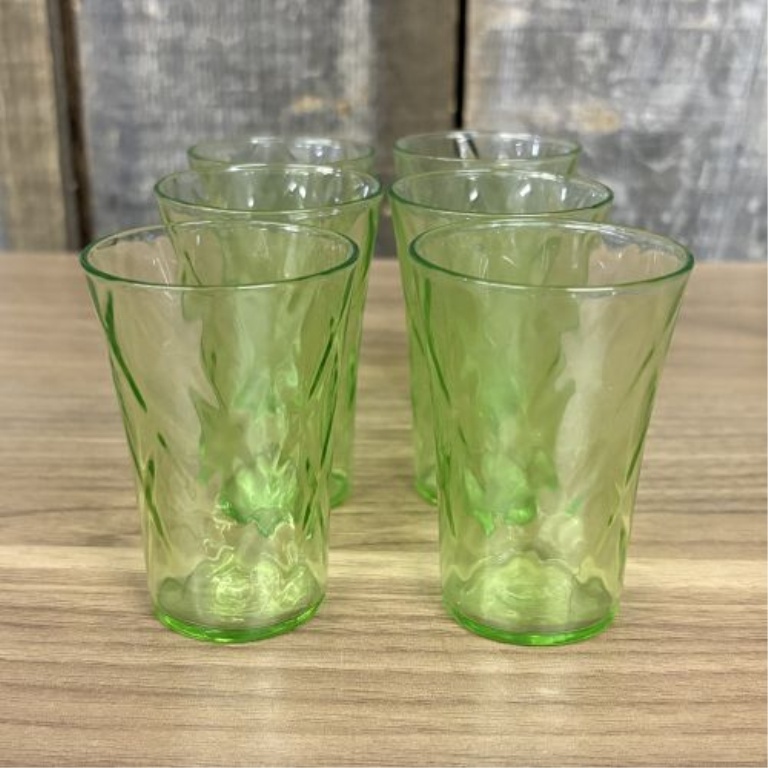 A Set of Six Green Uranium Depression Glass Shot Glasses with Optic Pattern