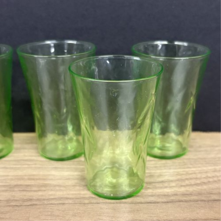 A Set of Six Green Uranium Depression Glass Shot Glasses with Optic Pattern