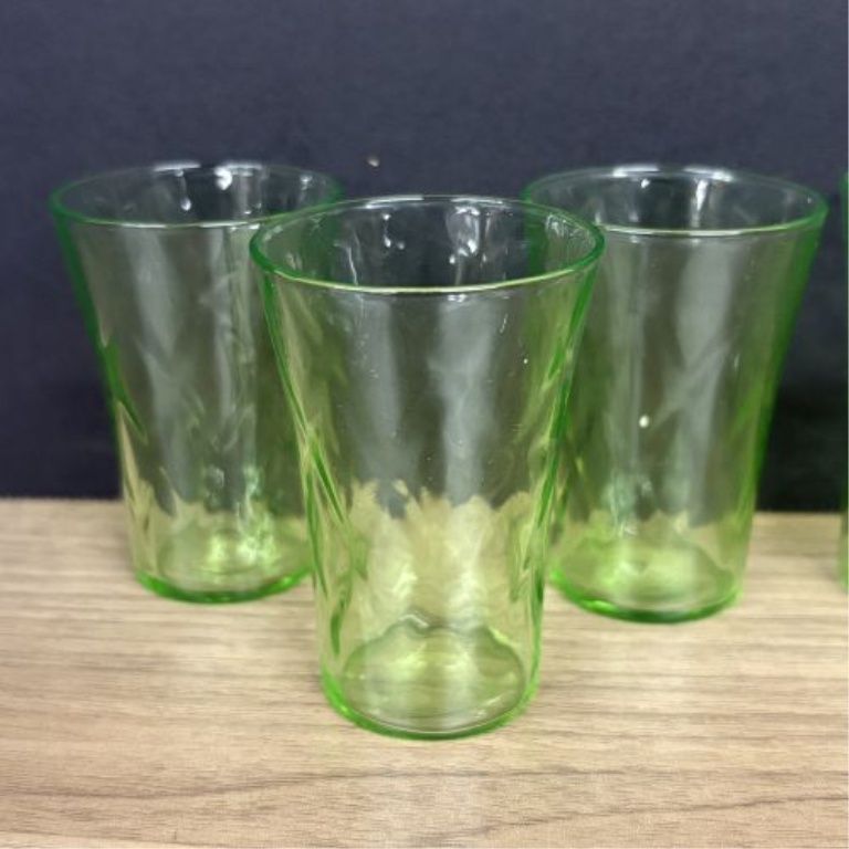 A Set of Six Green Uranium Depression Glass Shot Glasses with Optic Pattern