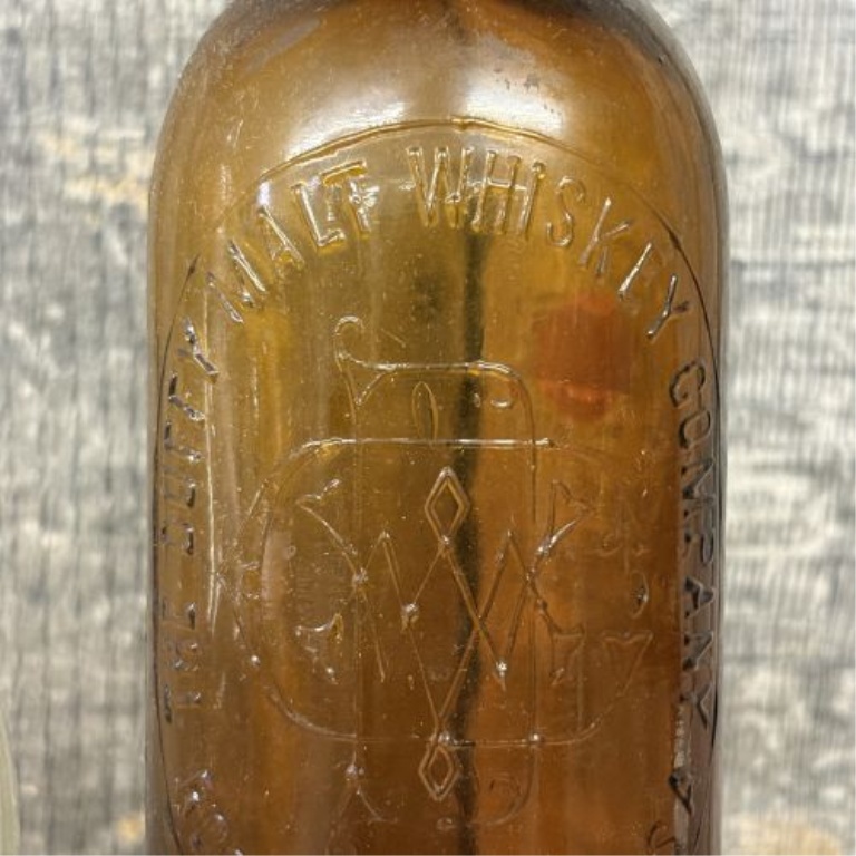 Two American Glass Bottles, Plainview Farms Dairy Milk and Duffy Malt Whiskey Company