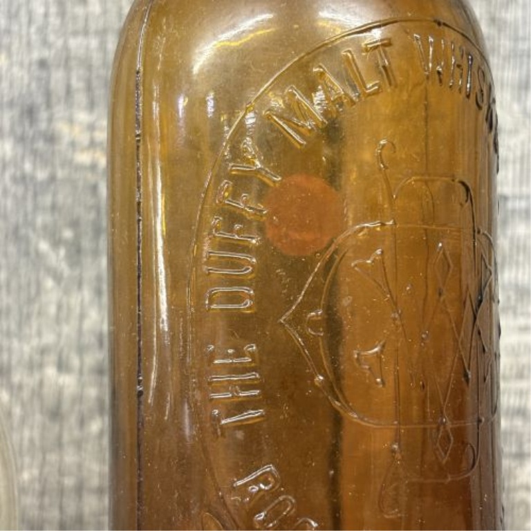 Two American Glass Bottles, Plainview Farms Dairy Milk and Duffy Malt Whiskey Company
