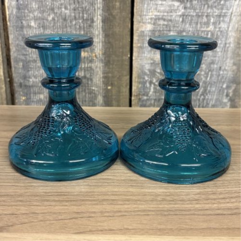 An Assortment of Four Vintage Blue Satin and Teal Pressed Glass Candlesticks