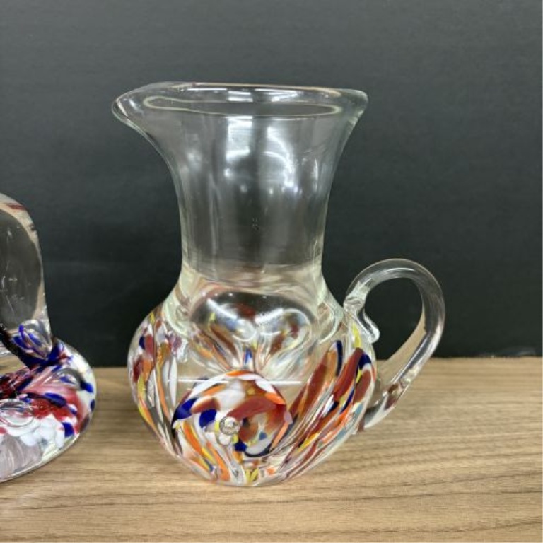A Trio of Art Glass Pieces Including a Saint-Louis Commemorative Paperweight, a Fish Figurine, and a Spatter Glass Pitcher