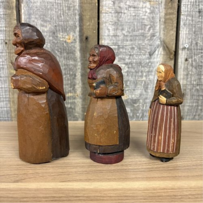A Set of Four Hand-Carved and Painted Wooden Folk Art Figurines Signed C. Warren Larkin
