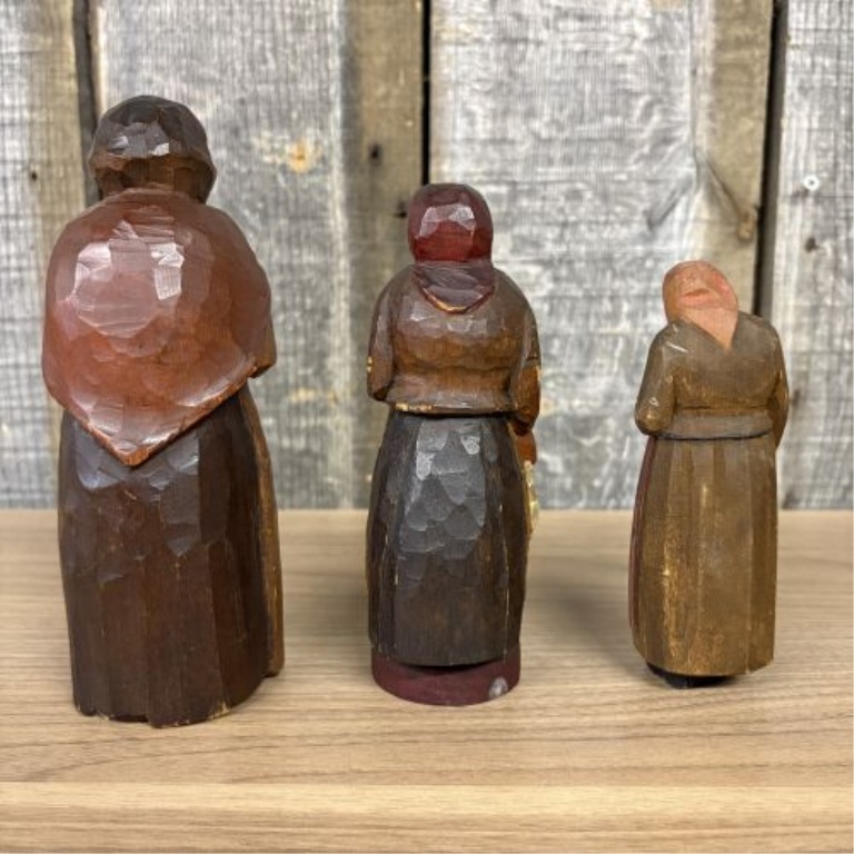 A Set of Four Hand-Carved and Painted Wooden Folk Art Figurines Signed C. Warren Larkin