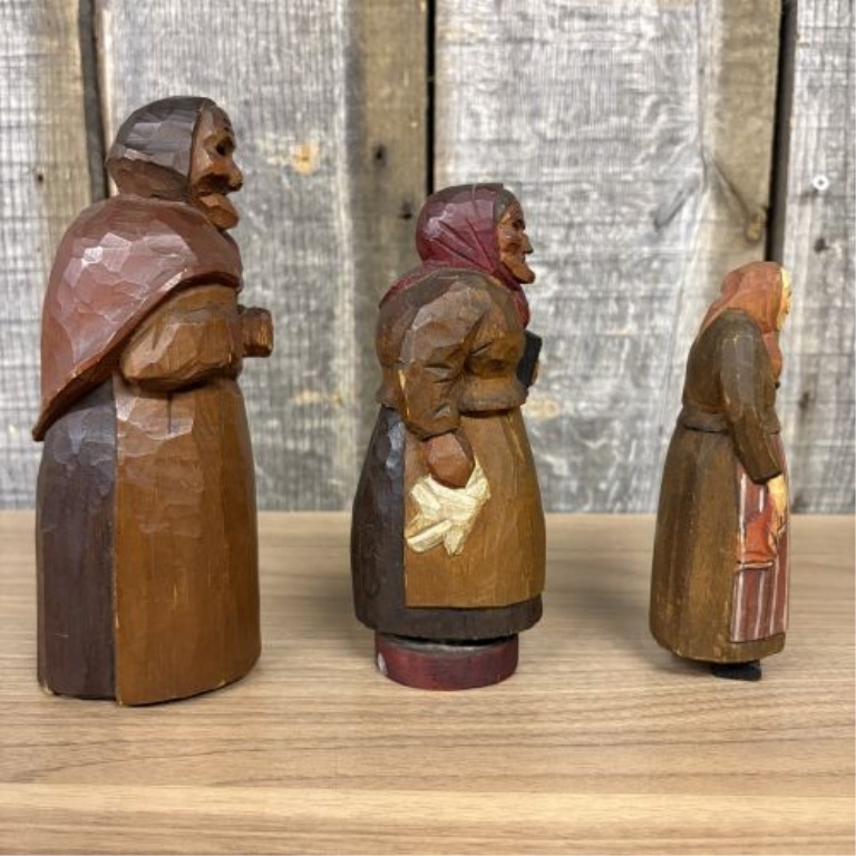 A Set of Four Hand-Carved and Painted Wooden Folk Art Figurines Signed C. Warren Larkin