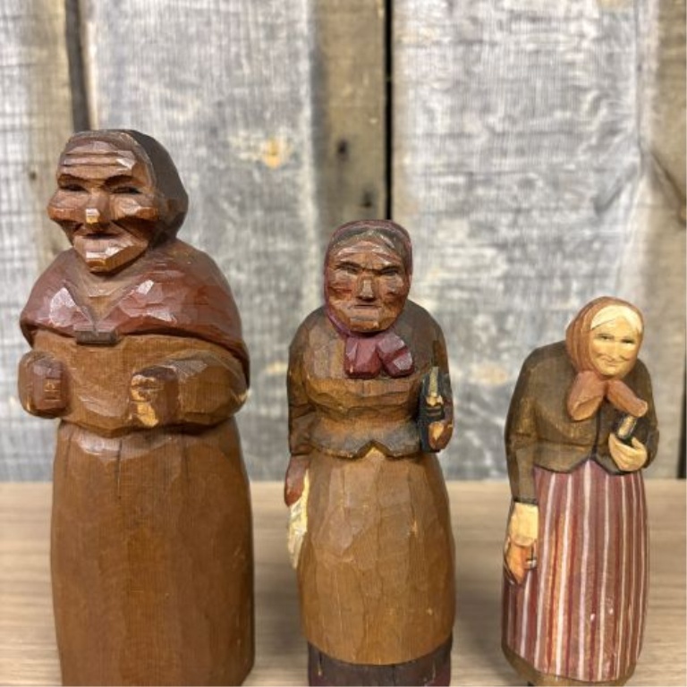 A Set of Four Hand-Carved and Painted Wooden Folk Art Figurines Signed C. Warren Larkin