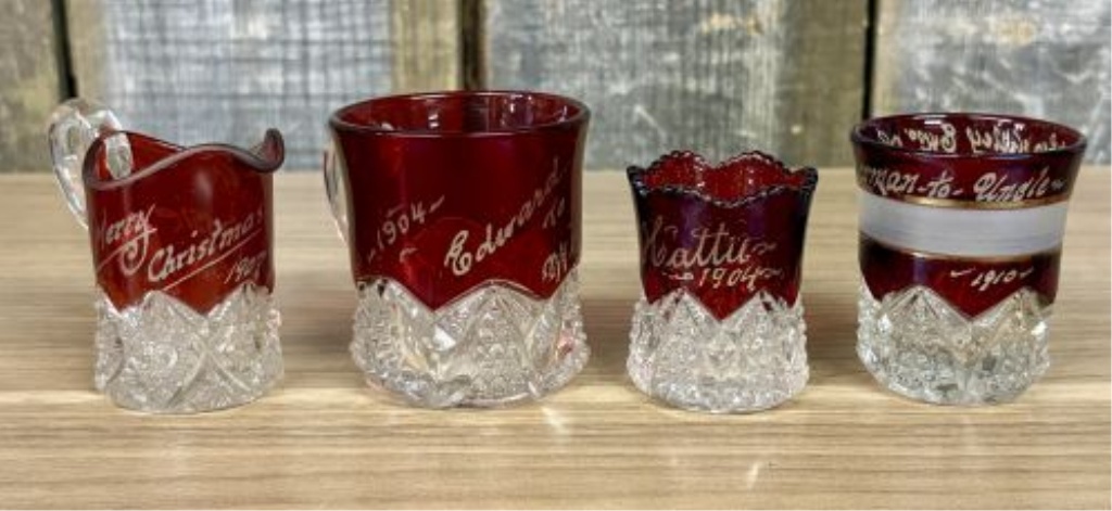 A Collection of Ruby-Stained EAPG Souvenir Glassware