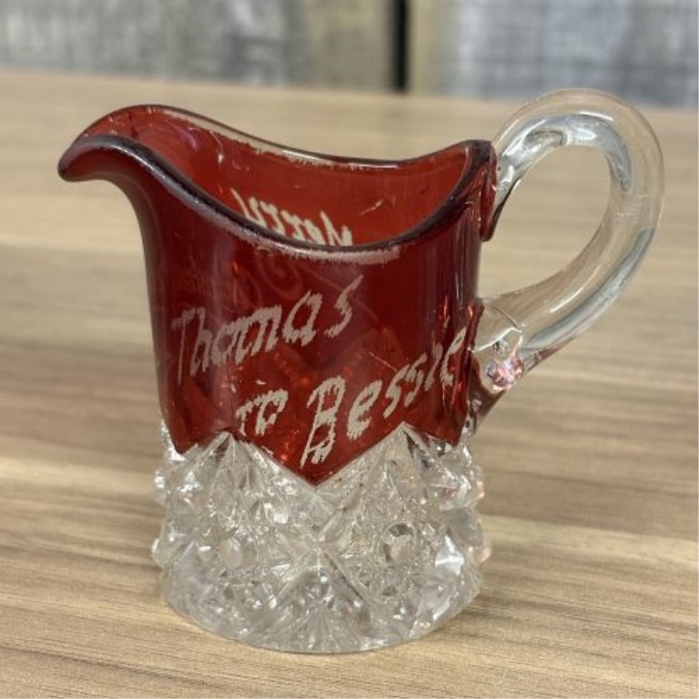 A Collection of Ruby-Stained EAPG Souvenir Glassware
