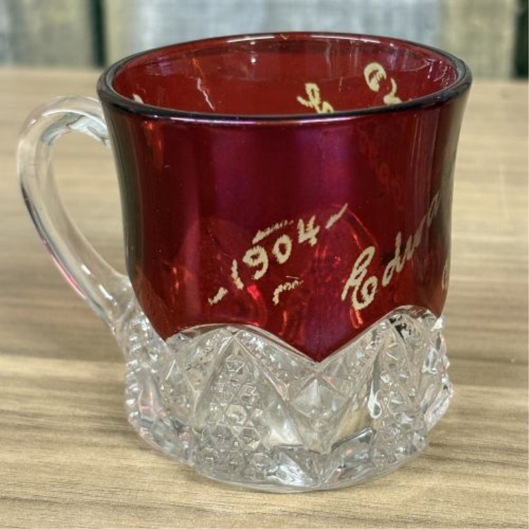 A Collection of Ruby-Stained EAPG Souvenir Glassware