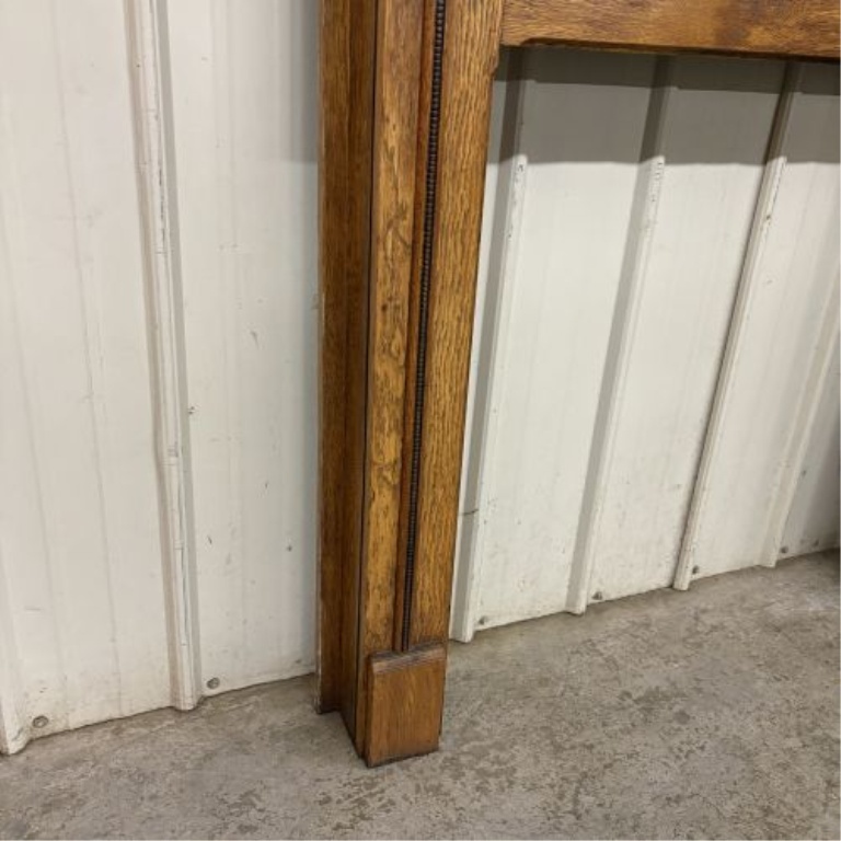 American Early 20th Century Oak Fireplace Mantel with Scrolled Corbels and Rope Molding
