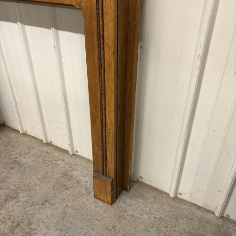 American Early 20th Century Oak Fireplace Mantel with Scrolled Corbels and Rope Molding