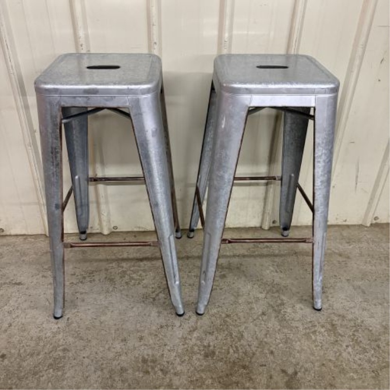 A Set of Four Industrial Distressed Metal Backless Bar Stools in the AmeriHome Loft Style