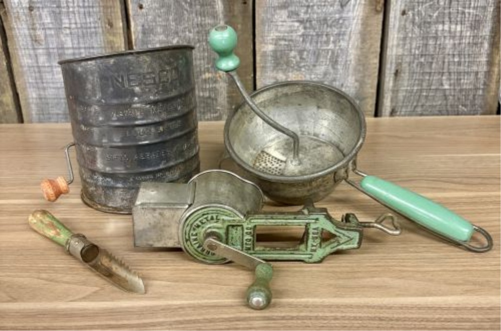 An Assortment of Vintage Mid-Century Kitchen Tools Including Nesco and Lorraine Metal Examples