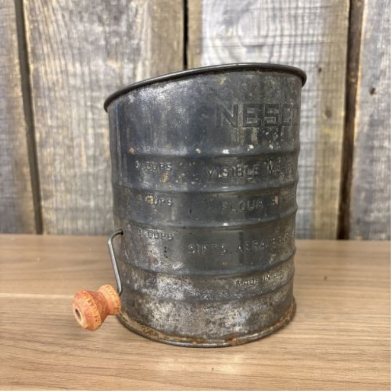 An Assortment of Vintage Mid-Century Kitchen Tools Including Nesco and Lorraine Metal Examples